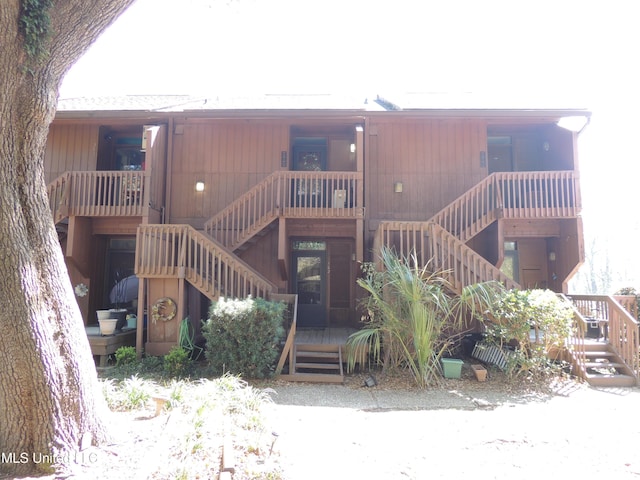 view of building exterior featuring stairs