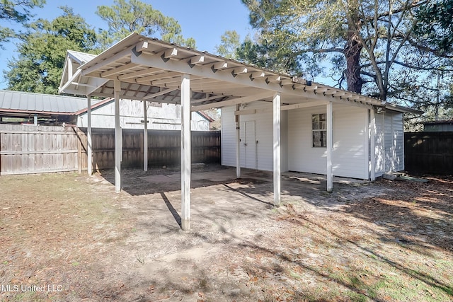 exterior space featuring a carport