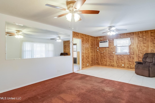 unfurnished living room with wooden walls, light carpet, and an AC wall unit