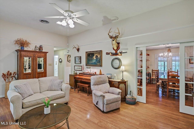 727 Laney Dr, Clinton, MS 39056 - living area featuring a chandelier, light wood-type flooring, and ceiling fan