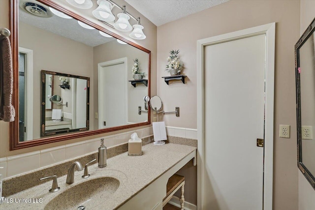 727 Laney Dr, Clinton, MS 39056 - bathroom featuring vanity and a textured ceiling