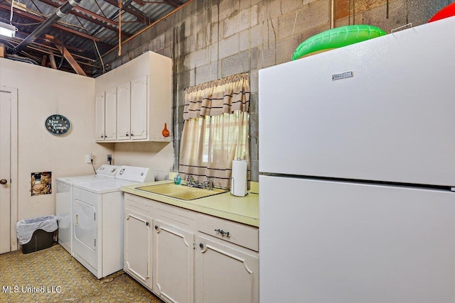 727 Laney Dr, Clinton, MS 39056 - laundry area with separate washer and dryer and cabinet space