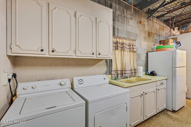727 Laney Dr, Clinton, MS 39056 - laundry room featuring washing machine and dryer and a sink