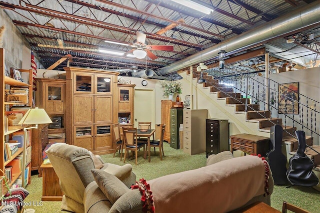727 Laney Dr, Clinton, MS 39056 - below grade area featuring light carpet, stairway, and ceiling fan