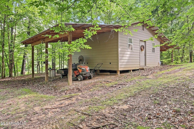 727 Laney Dr, Clinton, MS 39056 - view of outbuilding featuring a carport
