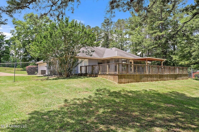 view of yard featuring a wooden deck