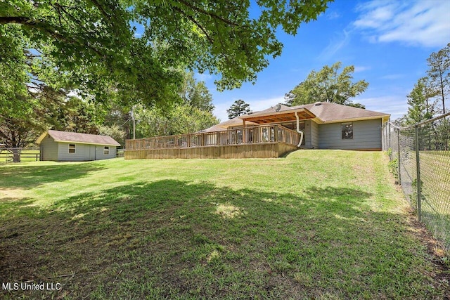 view of yard with a wooden deck