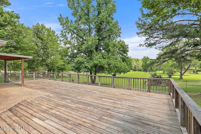 deck featuring a lawn