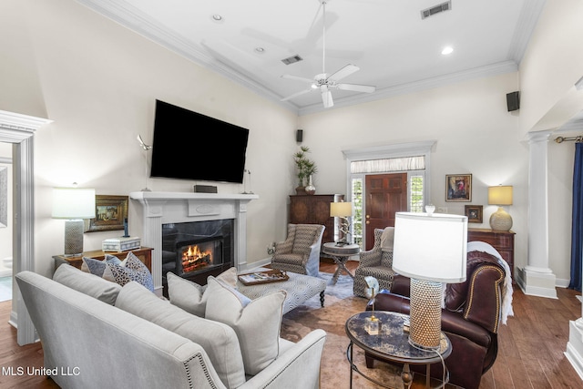 141 Whisper Lake Blvd, Madison, MS 39110 - living area with a high end fireplace, wood finished floors, ceiling fan, decorative columns, and ornamental molding