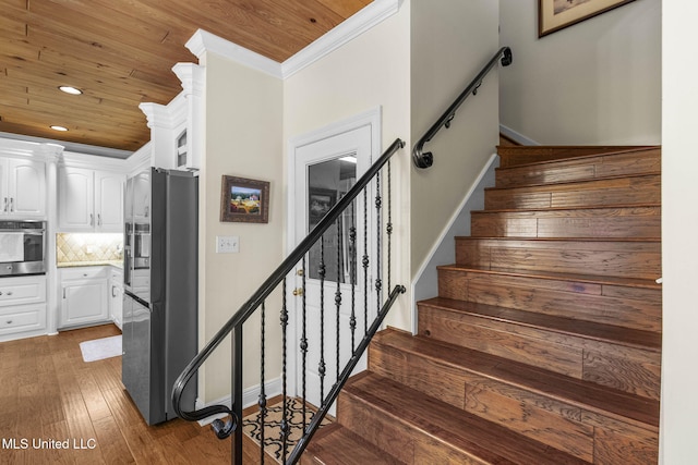 141 Whisper Lake Blvd, Madison, MS 39110 - staircase with recessed lighting, crown molding, wood-type flooring, and wood ceiling