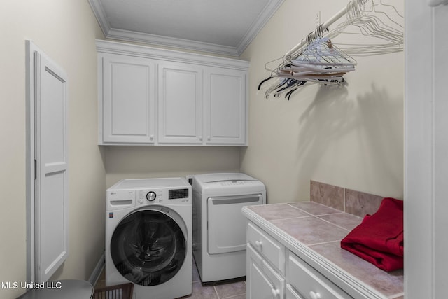 141 Whisper Lake Blvd, Madison, MS 39110 - laundry room with cabinet space, crown molding, separate washer and dryer, and light tile patterned floors