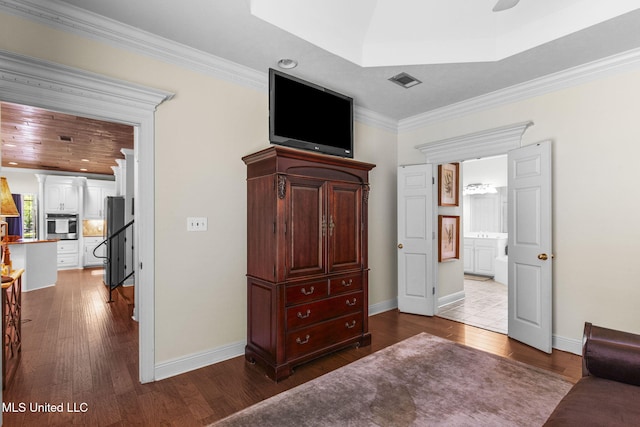 141 Whisper Lake Blvd, Madison, MS 39110 - bedroom featuring dark wood finished floors, freestanding refrigerator, ornamental molding, recessed lighting, and ensuite bathroom