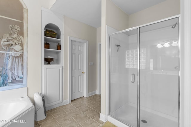 141 Whisper Lake Blvd, Madison, MS 39110 - bathroom featuring a shower stall, tile patterned flooring, and a garden tub