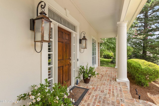 141 Whisper Lake Blvd, Madison, MS 39110 - doorway to property with covered porch and stucco siding