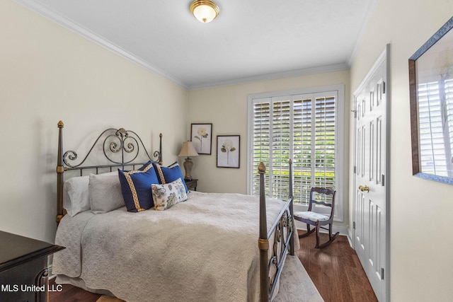 141 Whisper Lake Blvd, Madison, MS 39110 - bedroom with crown molding, dark wood-style floors, and a closet