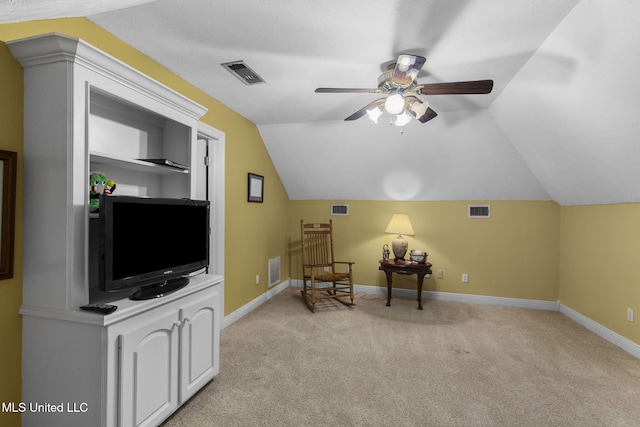 141 Whisper Lake Blvd, Madison, MS 39110 - living area featuring a ceiling fan, light colored carpet, and vaulted ceiling