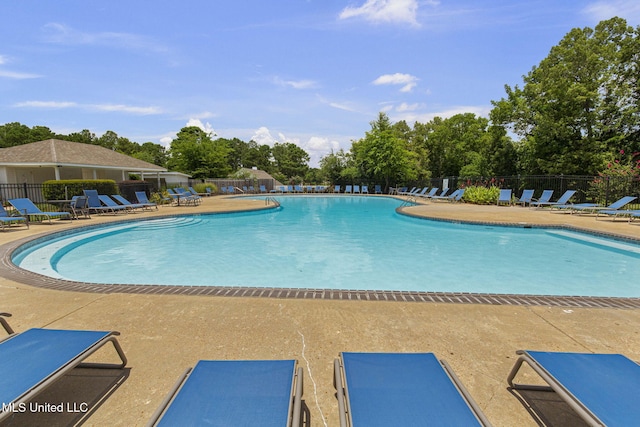 141 Whisper Lake Blvd, Madison, MS 39110 - community pool featuring a patio