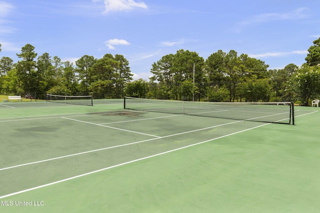 141 Whisper Lake Blvd, Madison, MS 39110 - view of tennis court featuring view of wooded area