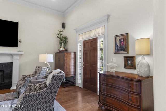 141 Whisper Lake Blvd, Madison, MS 39110 - entrance foyer featuring wood finished floors, a premium fireplace, and crown molding