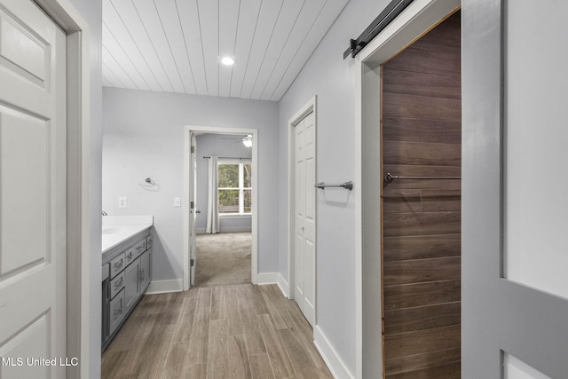107 Lakepointe Dr, Madison, MS 39110 - bathroom featuring wood finished floors, vanity, baseboards, wood ceiling, and a ceiling fan