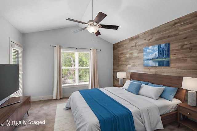 107 Lakepointe Dr, Madison, MS 39110 - carpeted bedroom with wood walls, multiple windows, an accent wall, vaulted ceiling, and baseboards