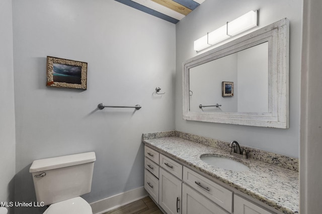 107 Lakepointe Dr, Madison, MS 39110 - bathroom with toilet, vanity, baseboards, and wood finished floors