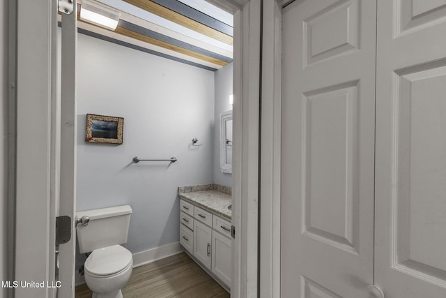 107 Lakepointe Dr, Madison, MS 39110 - bathroom with vanity, toilet, wood finished floors, and baseboards