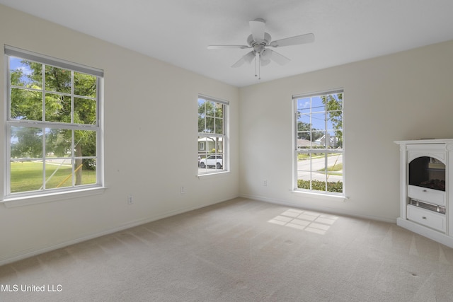 148 Acacia Ave, Biloxi, MS 39530 - unfurnished living room with healthy amount of natural light, carpet flooring, and ceiling fan