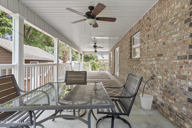 148 Acacia Ave, Biloxi, MS 39530 - view of patio / terrace with outdoor dining space and ceiling fan