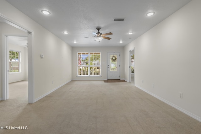 148 Acacia Ave, Biloxi, MS 39530 - unfurnished room with light colored carpet, ceiling fan, and recessed lighting