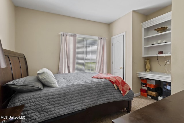 bedroom featuring carpet flooring