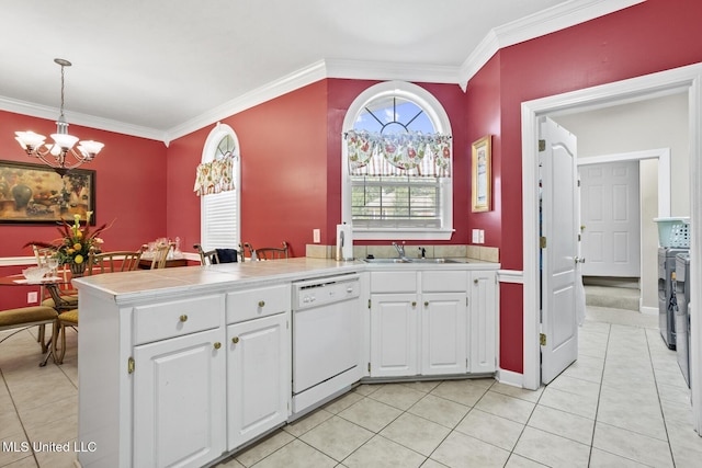 kitchen with dishwasher, a sink, a chandelier, light tile patterned floors, and crown molding
