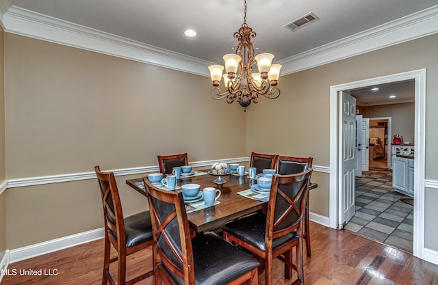 350 Edgewood Xing, Brandon, MS 39042 - dining room with ornamental molding, a chandelier, wood finished floors, and recessed lighting