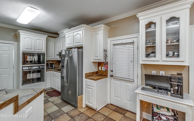 350 Edgewood Xing, Brandon, MS 39042 - kitchen with black appliances, crown molding, glass insert cabinets, and white cabinets