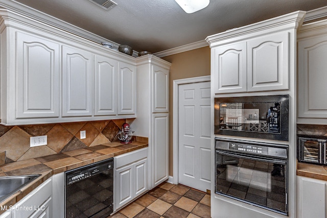 350 Edgewood Xing, Brandon, MS 39042 - kitchen featuring black appliances, tasteful backsplash, crown molding, and white cabinets