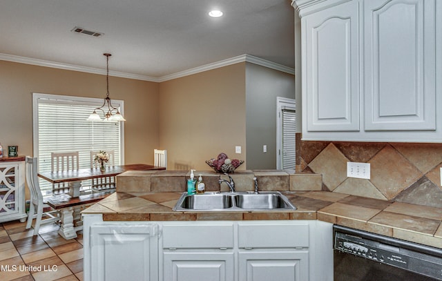 350 Edgewood Xing, Brandon, MS 39042 - kitchen featuring dishwasher, a peninsula, white cabinets, crown molding, and decorative light fixtures