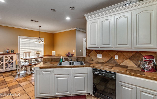 350 Edgewood Xing, Brandon, MS 39042 - kitchen featuring black dishwasher, a peninsula, crown molding, pendant lighting, and tasteful backsplash