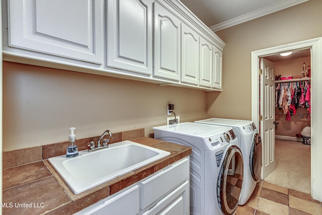 350 Edgewood Xing, Brandon, MS 39042 - laundry area with independent washer and dryer, cabinet space, crown molding, and light carpet
