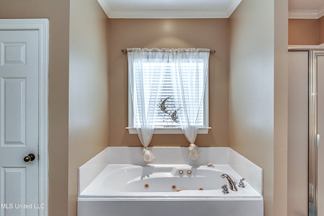 350 Edgewood Xing, Brandon, MS 39042 - bathroom featuring a tub with jets and ornamental molding