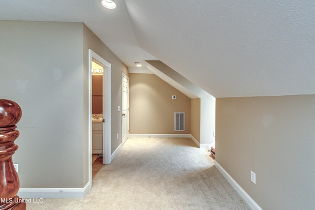 350 Edgewood Xing, Brandon, MS 39042 - additional living space featuring light colored carpet and lofted ceiling