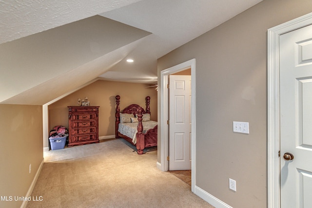 350 Edgewood Xing, Brandon, MS 39042 - bedroom featuring light colored carpet, vaulted ceiling, and recessed lighting