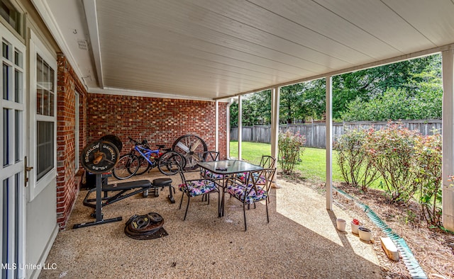 350 Edgewood Xing, Brandon, MS 39042 - fenced backyard with a patio and outdoor dining area