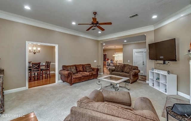350 Edgewood Xing, Brandon, MS 39042 - carpeted living area with ornamental molding, a chandelier, a ceiling fan, and recessed lighting