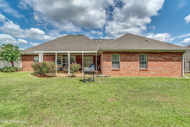 350 Edgewood Xing, Brandon, MS 39042 - back of house featuring a patio, roof with shingles, and brick siding