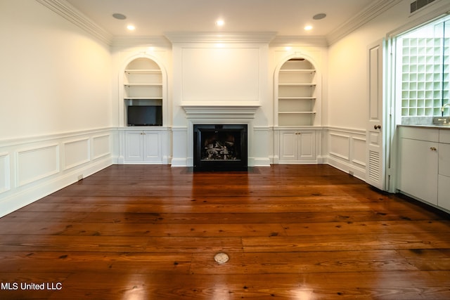 unfurnished living room with ornamental molding, built in features, and dark hardwood / wood-style flooring