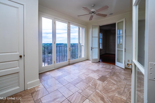 unfurnished sunroom featuring french doors