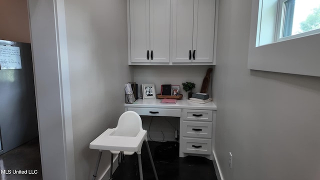 home office featuring built in desk