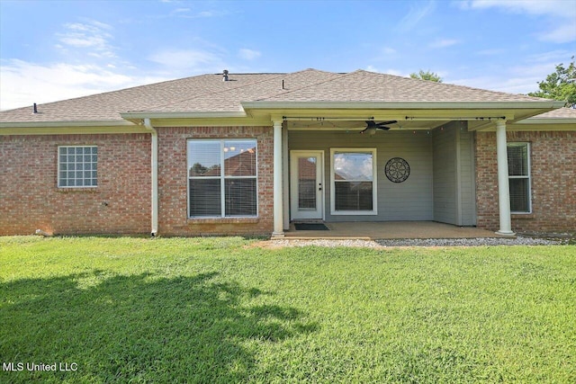 508 Oakleigh Pl, Brandon, MS 39047 - back of property featuring a ceiling fan, a patio area, a shingled roof, and a yard