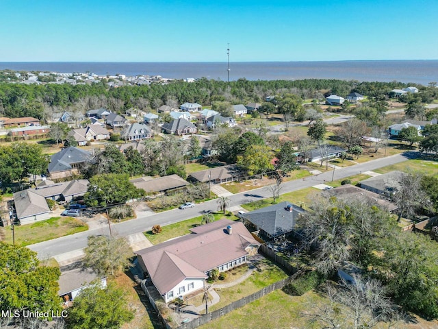 birds eye view of property featuring a residential view and a water view