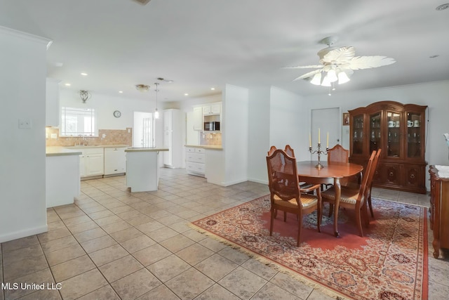 dining area with recessed lighting, ceiling fan, baseboards, and light tile patterned floors